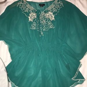 Aqua shirt with flowers